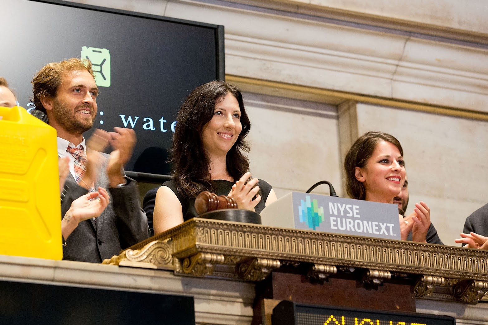 A photo of Denny McFadden on the day charity: water rang the NYSE closing bell